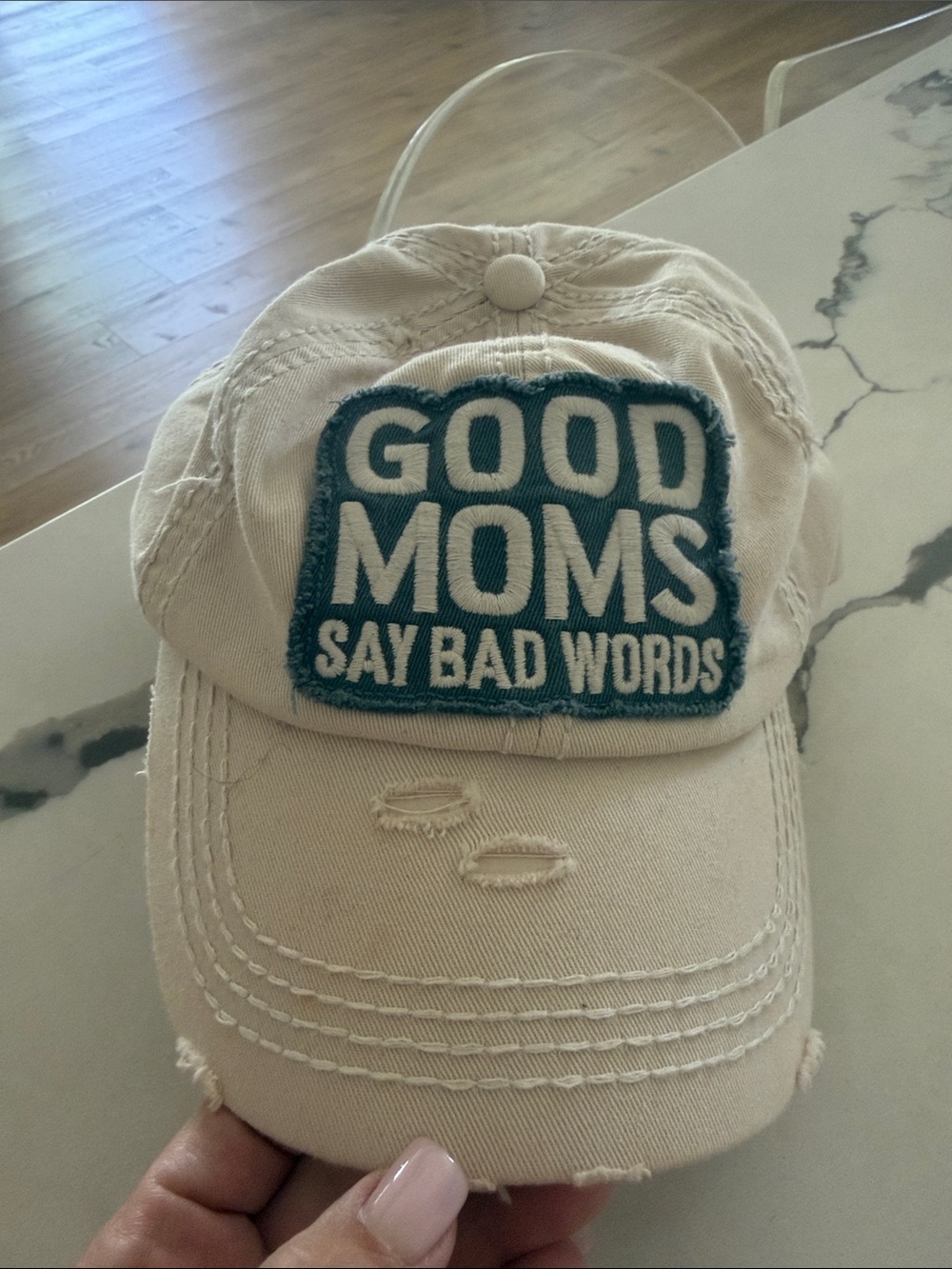 kitson Beige Baseball Hat with Teal Patch - "GOOD MOMS SAY BAD WORDS"